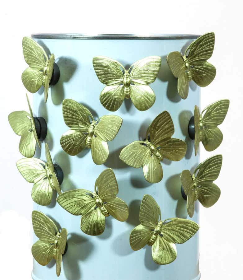 Brass Butterfly Magnets on light blue can