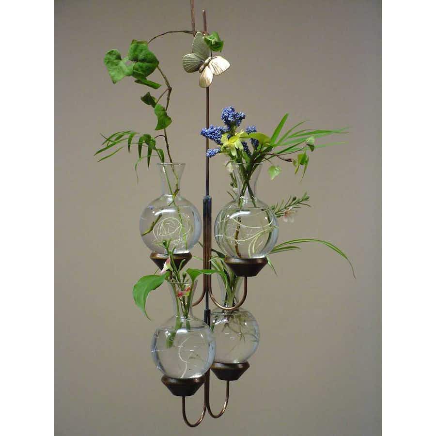 Four Vase Plant Propagation Rooter with plants in water