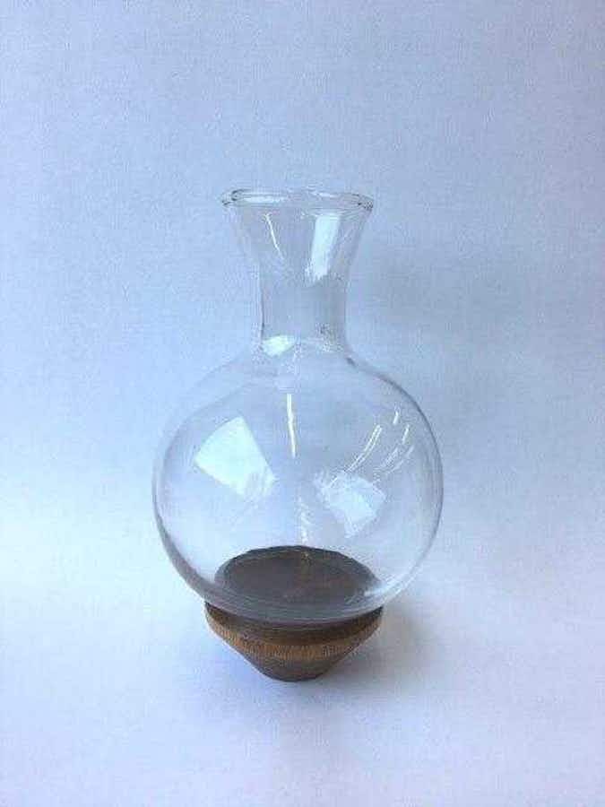Hand Blown Glass Replacement Vase with dark wood on a table
